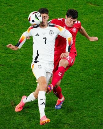 Kai Havertz of Germany and Andreas Christensen of Denmark Germany v Denmark, UEFA European Championship, EM, Europameisterschaft 2024, Round of 16, Football, BVB Stadion, Dortmund, Germany - 29 Jun 2024 EDITORIAL USE ONLY No use with unauthorised audio, video, data, fixture lists, club league logos or live services. Online in-match use limited to 120 images, no video emulation. No use in betting, games or single club league player publications.  Copyright: xDavexShopland Shutterstockx 14562067l