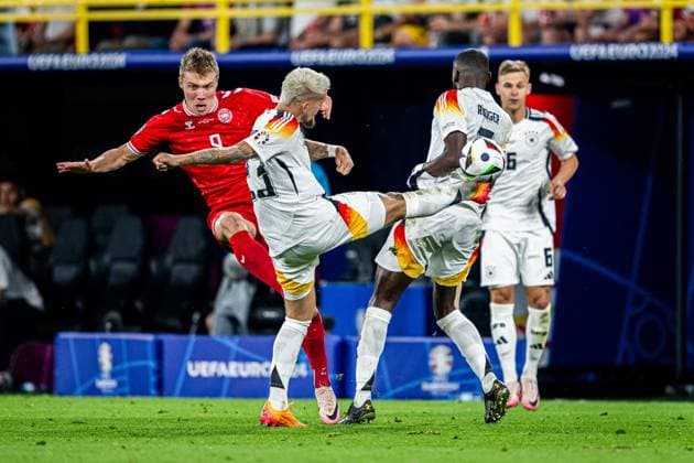 240629 Rasmus Hojlund of Denmark and Robert Andrich and Antonio Ruediger of Germany during the UEFA Euro 2024 Football Championship round of 16 match between Germany and Denmark on June 29, 2024 in Dortmund Photo Jesper Zerman BILDBYRAN kod JZ JZ0545 fotboll football soccer fotballs em europamästerskap em uefa euro uefa european football championship euro 2024 tyskland germany danmark denmark bbeng  Copyright: JESPERxZERMAN BB240629JZ082