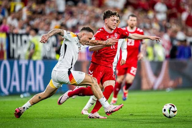240629 David Raum of Germany and Andreas Skov Olsen of Denmark during the UEFA Euro 2024 Football Championship round of 16 match between Germany and Denmark on June 29, 2024 in Dortmund Photo Jesper Zerman BILDBYRAN kod JZ JZ0545 fotboll football soccer fotballs em europamästerskap em uefa euro uefa european football championship euro 2024 tyskland germany danmark denmark bbeng  Copyright: JESPERxZERMAN BB240629JZ099