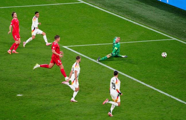 Jamal Musiala of Germany scores the second goal past Kasper Schmeichel of Denmark 2-0 Germany v Denmark, UEFA European Championship, EM, Europameisterschaft 2024, Round of 16, Football, BVB Stadion, Dortmund, Germany - 29 Jun 2024 EDITORIAL USE ONLY No use with unauthorised audio, video, data, fixture lists, club league logos or live services. Online in-match use limited to 120 images, no video emulation. No use in betting, games or single club league player publications. Copyright: xDavexShopland Shutterstockx 14562067x