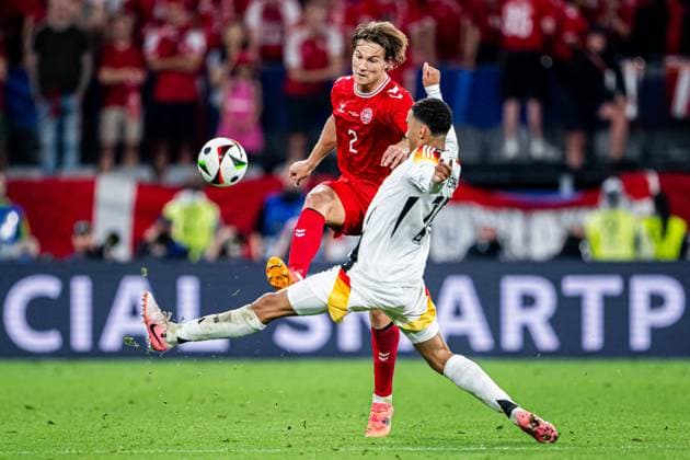 240629 Joachim Andersen of Denmark and Jamal Musiala of Germany during the UEFA Euro 2024 Football Championship round of 16 match between Germany and Denmark on June 29, 2024 in Dortmund Photo Jesper Zerman BILDBYRAN kod JZ JZ0545 fotboll football soccer fotballs em europamästerskap em uefa euro uefa european football championship euro 2024 tyskland germany danmark denmark bbeng  Copyright: JESPERxZERMAN BB240629JZ116
