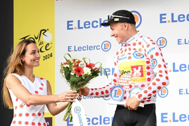 JONAS ABRAHAMSEN CELEBRATING ON THE PODIUM OF THE FIRST STAGE OF THE TOUR DE FRANCE 2024 IN RIMINI WITH THE GRIMPEUR JERSEY during Stage 1 - Finish, Tour De France race in Rimini, Italy, June 29 2024  Copyright: xGianlucaxRicci IPAxSportx xipa-ax xx IPA_47604948 IPA_Agency_IPA47604948