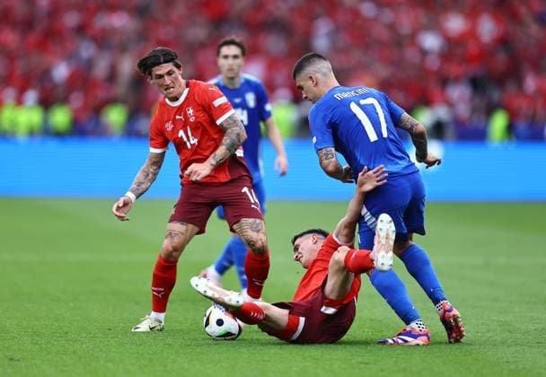 Vincent Sierro of Switzerland competes for the ball with Gianluca Mancini of Italy Switzerland v Italy, UEFA European Championship, EM, Europameisterschaft 2024, Round of 16, Football, Olympiastadion, Berlin, Germany - 29 Jun 2024 EDITORIAL USE ONLY No use with unauthorised audio, video, data, fixture lists, club league logos or live services. Online in-match use limited to 120 images, no video emulation. No use in betting, games or single club league player publications. Copyright: xMichaelxZemanek Shutterstockx 14562039fb