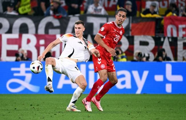 Football, European Championship, EURO 2024, Round of 16, Signal Iduna Park Dortmund Germany Denmark 2 0 Nico Schlotterbeck GER , Yussuf Poulsen DEN Action