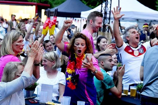 Public viewing of the European Championship soccer match between Germany and Denmark in Witten FOR EDITORIAL PURPOSES ONLY EDITORIAL USE ONLY p Thanks to the spirited German attacking soccer, the atmosphere in the audience is still undimmed Around three hundred soccer fans come to watch the soccer European Championship round of 16 match between Germany and Denmark on June 29, 2024 at the outdoor pool on Herdecker Straße in Witten After just twelve minutes, the broadcast was cut short due to a thunderstorm warning The audience followed the instructions of the security staff and left the grounds somewhat grumpily, but very disciplined Germany NRW Witten Copyright JürgenxTheobald Copyright: JürgenxTheobald doc7w32stqd5te1ndm04i12 ,EDITORIAL USE ONLY Copyright: JürgenxTheobald