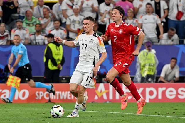 29 06 2024, xjrdrx, Football EM 2024 1 8 Final, Germany Denmark emspor, v l Florian Wirtz Deutsche Fussball Nationalmannschaft DFB Joachim Christian Andersen Denmark Daenemark Zweikampf, Aktion, action, battle for the ball DFL DFB REGULATIONS PROHIBIT ANY USE OF PHOTOGRAPHS as IMAGE SEQUENCES and or QUASI VIDEO Dortmund