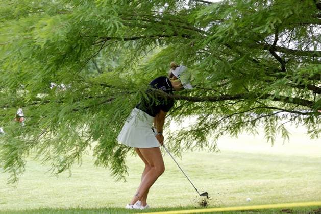 MIDLAND, MI - JUNE 29: LPGA, Golf Damen golfer Nataliya Guseva chips out from under a tree on the 5th hole during the third round of the LPGA Dow Championship on June 29, 2024, at Midland Country Club in Midland, Michigan. (Photo by Brian Spurlock Icon Sportswire) GOLF: JUN 29 LPGA Dow Championship EDITORIAL USE ONLY Icon24062925
