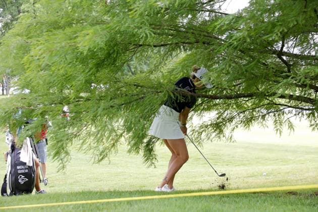 MIDLAND, MI - JUNE 29: LPGA, Golf Damen golfer Nataliya Guseva chips out from under a tree on the 5th hole during the third round of the LPGA Dow Championship on June 29, 2024, at Midland Country Club in Midland, Michigan. (Photo by Brian Spurlock Icon Sportswire) GOLF: JUN 29 LPGA Dow Championship EDITORIAL USE ONLY Icon24062926