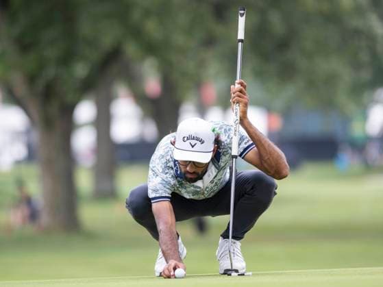 DETROIT, MI - JUNE 29: Akshay Bhatia (USA) sets his ball on the green during the third round of the Rocket Mortgage Classic on June 29, 2024 at Detroit Golf Club in Detroit, Michigan. (Photo by Joseph Weiser Icon Sportswire) GOLF: JUN 29 PGA, Golf Herren Rocket Mortgage Classic EDITORIAL USE ONLY Icon2406290443