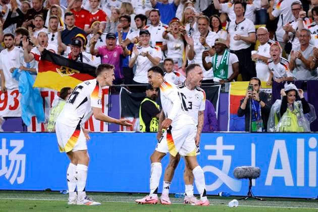 MUSIALA Jamal Team Germany cheers after his goal for the 2 0 final score with SCHLOTTERBECK Nico and RAUM David UEFA Football EURO 2024 in Germany Round of 16 match Germany Denmark 2 0 on 29 06 2024 in Dortmund DFL REGULATIONS PROHIBIT ANY USE OF PHOTOGRAPHS as IMAGE SEQUENCES and or QUASI VIDEO Copyright: xLacixPerenyix
