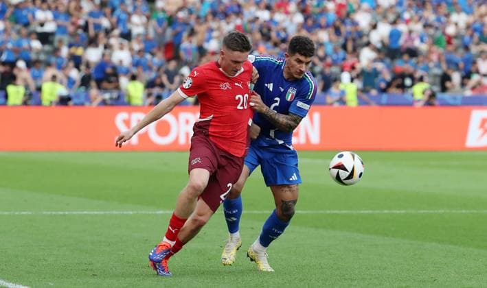 Michel Aebischer in a duel with Giovanni Di Lorenzo Sport Football Soccer European Championship Euro 2024 European Championship Men Season 2023 2024 29 06 2024 Switzerland SUI vs Italy ITA in Berlin DFL regulations prohibit any use of photographs as image sequences and or quasi video