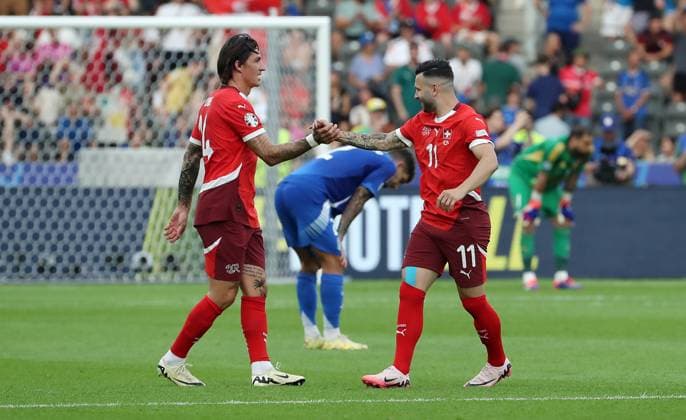 Steven Zuber cheers with Renato Steffen after the end of the match Joy Emotion Cheering Sport Football Soccer European Championship Euro 2024 European Championship Men Season 2023 2024 29 06 2024 Switzerland SUI vs Italy ITA in Berlin DFL regulations prohibit any use of photographs as image sequences and or quasi video