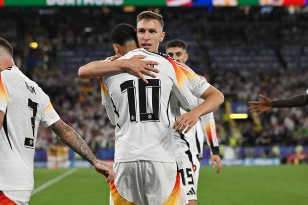 Nico Schlotterbeck Germany hugs after the 2 0 Jamal Musiala Germany 29 06 2024, European Football Championship 2024, Round of 16 Germany Denmark 2 0 Dortmund North Rhine-Westphalia Germany Team2