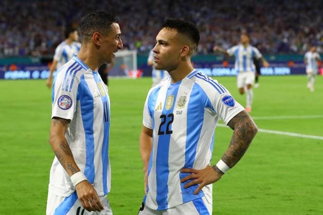 Argentina s forward Lautaro Martinez R celebrates with his teammate forward Angel Di Maria after scoring the team™s second goal against Peru during the Copa America USA 2024, group A match between Argentina and Peru, at Hard Rock stadium in Miami, on June 29, 2024 MIAMI UNITED STATES Copyright: xALEJANDROxPAGNIx