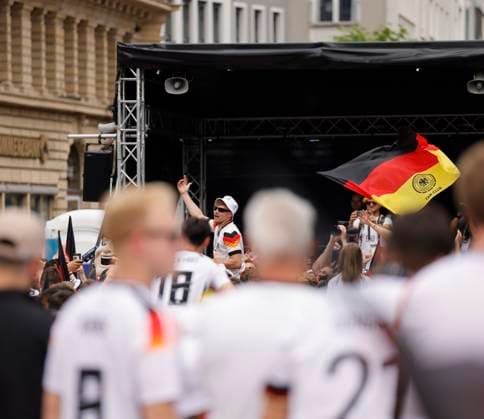 Germany Hesse Frankfurt am Main 23 06 2024 European Football Championship 2024 European Championship type with the saxophone, saxophonist in Völler jersey, Andre Schnura with the black saxophone Sport Public Viewing in Frankfurt