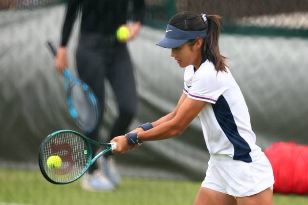 30th June 2024; All England Lawn Tennis and Croquet Club, London, England; Wimbledon Tennis Tournament, Practice Day; Emma Raducanu wears an England football shirt during her practice session  ActionPlus12661930 ShaunxBrooks