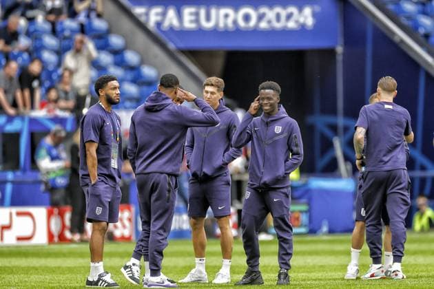 GELSENKIRCHEN, 30-06-20204, Stadium Veltins Arena, European Football Championship Euro2024, Round of 16 match no.40 between England and Slovakia. England player Bukayo Saka and England player John Stones inspecting the pitch England - Slovakia (Euro2024)  x25640437x Copyright: