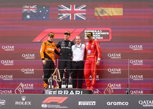 FORMULA 1 - GP of Austria 2024 SPIELBERG,AUSTRIA,30.JUN.24 - MOTORSPORTS, FORMULA 1 - Grand Prix of Austria, Red Bull Ring, award ceremony. Image shows Oscar Piastri (AUS McLaren), George Russell (GBR Mercedes), Marcus Dudley (Mercedes) and Carlos Sainz (ESP Ferrari).  GEPAxpictures xDanielxGoetzhaber