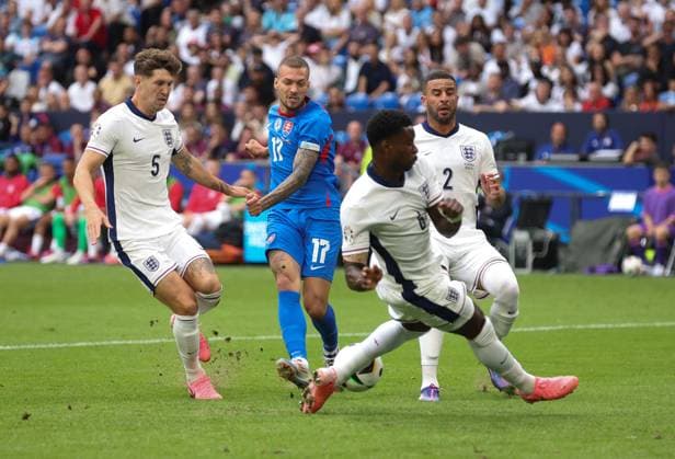 EURO 2024, England - Slowakei Lukas Haraslin of Slovakia has his shot blocked by Marc Guà hi of England England v Slovakia, UEFA European Championship, EM, Europameisterschaft 2024, Round of 16, Football, Arena AufSchalke, Gelsenkirchen, Germany - 30 Jun 2024 EDITORIAL USE ONLY No use with unauthorised audio, video, data, fixture lists, club league logos or live services. Online in-match use limited to 120 images, no video emulation. No use in betting, games or single club league player publications. Copyright: xPaulxCurrie Shutterstockx 14562219bb