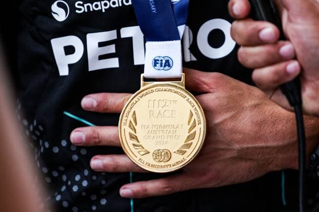 RUSSELL George (gbr), Mercedes AMG F1 Team W15, portrait FIA medal during the Formula 1 Qatar Airways Austrian Grand Prix 2024, 11th round of the 2024 Formula One World Championship, WM, Weltmeisterschaft from June 28 to 30, 2024 on the Red Bull Ring, in Spielberg, Austria - F1 - AUSTRIAN GRAND PRIX 2024 DPPI Panoramic  240630_R11_AUSTRIA_DP_XB3_1546