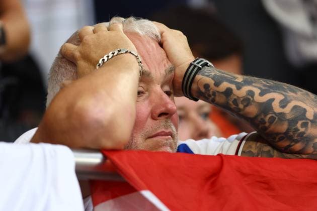 EURO 2024, England - Slowakei Dejected England fan England v Slovakia, UEFA European Championship, EM, Europameisterschaft 2024, Round of 16, Football, Arena AufSchalke, Gelsenkirchen, Germany - 30 Jun 2024 EDITORIAL USE ONLY No use with unauthorised audio, video, data, fixture lists, club league logos or live services. Online in-match use limited to 120 images, no video emulation. No use in betting, games or single club league player publications. Copyright: xKieranxMcManus Shutterstockx 14562217bs