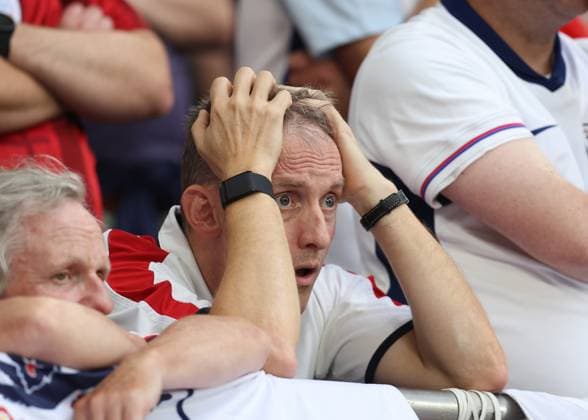 EURO 2024, England - Slowakei Gelsenkirchen, Germany, 30th June 2024. Frustrated England fans look on during the UEFA European Championships round of 16 match at Arena Aufschalke, Gelsenkirchen. Picture credit should read: Paul Terry Sportimage EDITORIAL USE ONLY. No use with unauthorised audio, video, data, fixture lists, club league logos or live services. Online in-match use limited to 120 images, no video emulation. No use in betting, games or single club league player publications. SPI-3212-0074