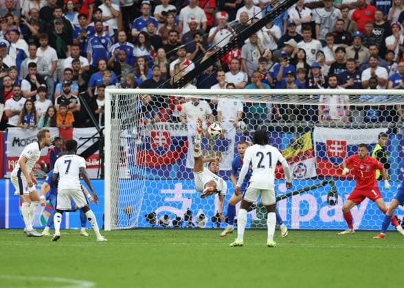 Gelsenkirchen, Germany, 30th June 2024. Jude Bellingham of England scores the equalising goal in the last minute with an overhead kick during the UEFA European Championships round of 16 match at Arena Aufschalke, Gelsenkirchen. Picture credit should read: Paul Terry Sportimage EDITORIAL USE ONLY. No use with unauthorised audio, video, data, fixture lists, club league logos or live services. Online in-match use limited to 120 images, no video emulation. No use in betting, games or single club league player publications. SPI-3212-0088