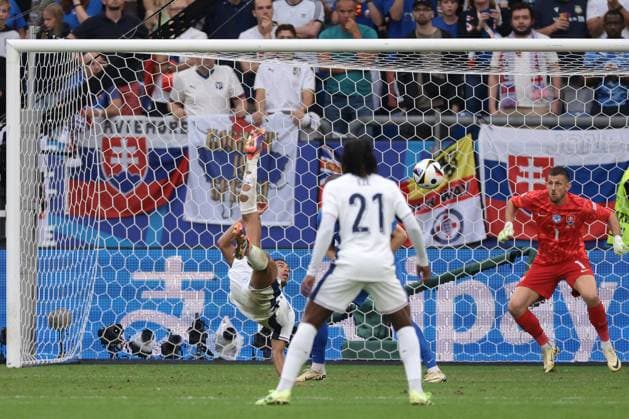 Gelsenkirchen, Germany, 30th June 2024. Jude Bellingham of England scores to level the game at 1-1 during the UEFA European Championships Round of 16 match at Arena Aufschalke, Gelsenkirchen. Picture credit should read: Jonathan Moscrop Sportimage EDITORIAL USE ONLY. No use with unauthorised audio, video, data, fixture lists, club league logos or live services. Online in-match use limited to 120 images, no video emulation. No use in betting, games or single club league player publications. SPI-3209-0002
