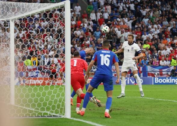 Gelsenkirchen, Germany, 30th June 2024. Harry Kane of England scores their second goal in extra time during the UEFA European Championships round of 16 match at Arena Aufschalke, Gelsenkirchen. Picture credit should read: Paul Terry Sportimage EDITORIAL USE ONLY. No use with unauthorised audio, video, data, fixture lists, club league logos or live services. Online in-match use limited to 120 images, no video emulation. No use in betting, games or single club league player publications. SPI-3212-0095