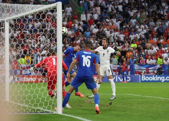 Gelsenkirchen, Germany, 30th June 2024. Harry Kane of England scores their second goal in extra time during the UEFA European Championships round of 16 match at Arena Aufschalke, Gelsenkirchen. Picture credit should read: Paul Terry Sportimage EDITORIAL USE ONLY. No use with unauthorised audio, video, data, fixture lists, club league logos or live services. Online in-match use limited to 120 images, no video emulation. No use in betting, games or single club league player publications. SPI-3212-0098