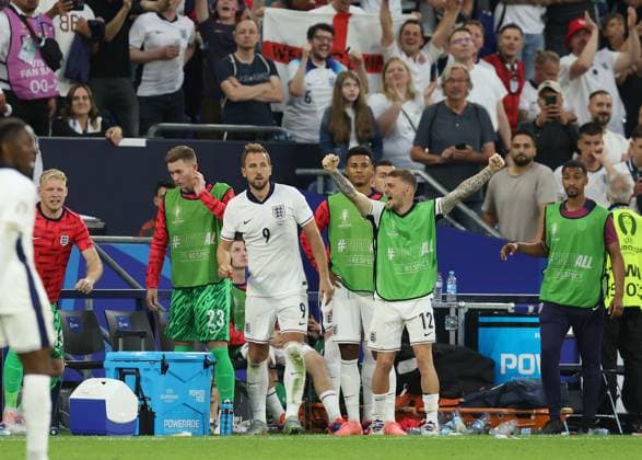 EURO 2024, England - Slowakei Gelsenkirchen, Germany, 30th June 2024. Kieran Trippier of England leads the celebrations on the final whistle during the UEFA European Championships round of 16 match at Arena Aufschalke, Gelsenkirchen. Picture credit should read: Paul Terry Sportimage EDITORIAL USE ONLY. No use with unauthorised audio, video, data, fixture lists, club league logos or live services. Online in-match use limited to 120 images, no video emulation. No use in betting, games or single club league player publications. SPI-3212-0114