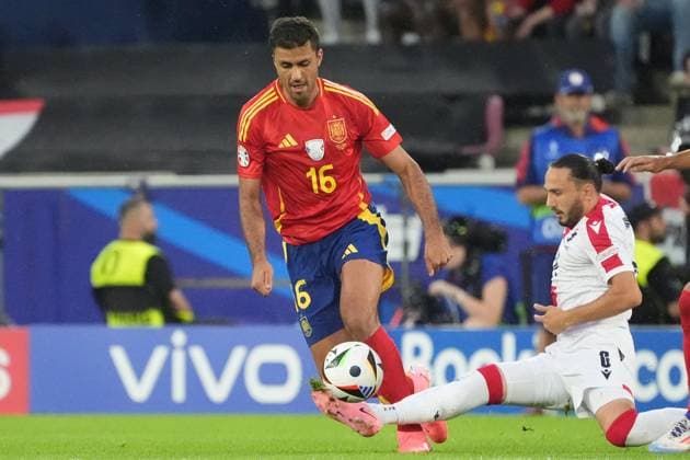 Girogi Kochorashvili Georgia, Georgia, 06 separates Rodri Spain Spain, 16 from the ball Cologne 30 06 2024 Spain vs Georgia, EURO2024 M37, round of 16, EM Arena Cologne
