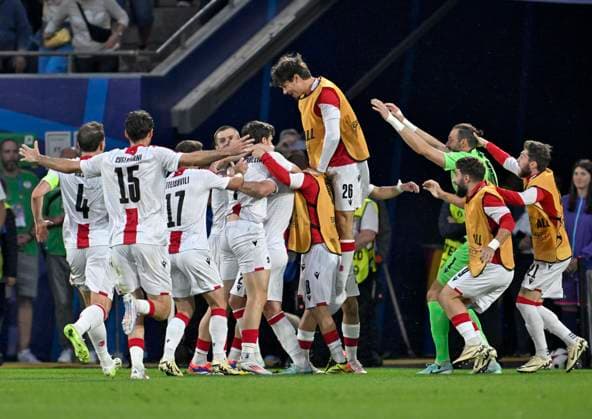 30 06 2024, Football UEFA EURO 2024, round of 16, Spain Georgia, at Cologne Stadium, group cheer of the Georgians