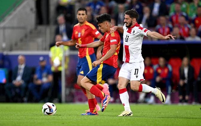 Football Euro 2024 Round of 16 30 06 2024 Spain Georgia Pedri left, Spain v Otar Kiteishvili right, Georgia
