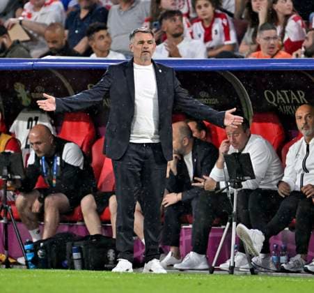 30 06 2024, Football UEFA EURO 2024, Round of 16, Spain Georgia, at Cologne Stadium, Coach Willy Sagnol Georgia spreads his arms out