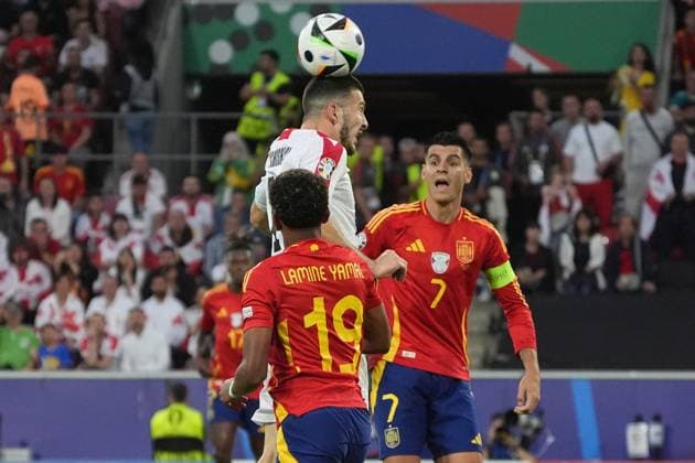 Luka Lochoshvili Georgia, Georgia, 14 clears against Lamine Yamal Spain Spain, 19 , Alvaro Morata Spain Spain, 07 Cologne 30 06 2024 Spain vs Georgia, EURO2024 M37, Round of 16, EM Arena Cologne