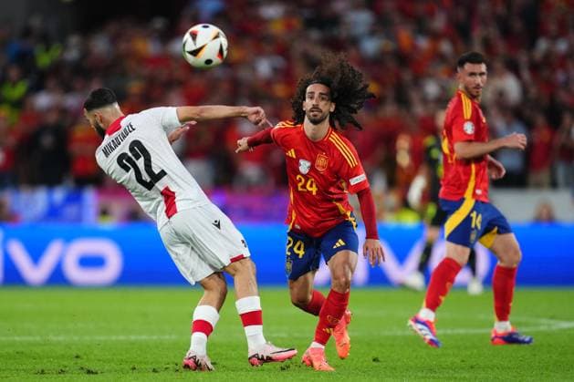 GER: Spain v Georgia. UEFA EURO, EM, Europameisterschaft,Fussball 2024 Marc Cucurella of Spain and Georges Mikautadze of Georgia during the UEFA Euro 2024 match between Spain and Georgia, Round of 16, played at Rhein Energie Stadium on June 30, 2024 in Koln, Germany. kpng Copyright: xBaguxBlancox xPRESSINPHOTOx PS_240630_ESP_GEO_015