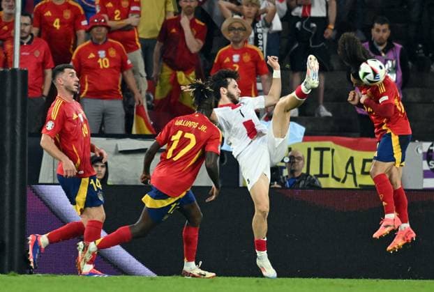 30 06 2024, xsltx, European Football Championship 2024 1 8 Final, Spain Georgia emspor, v l Aymeric Laporte Fevre Spain , Nicholas Williams Arthuer Jr Spain , Khvicha Kvaratskhelia Georgia , Marc Cucurella Saseta Spain DFL DFB REGULATIONS PROHIBIT ANY USE OF PHOTOGRAPHS as IMAGE SEQUENCES and or QUASI VIDEO Köln