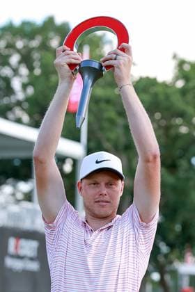 Rocket Mortgage Classic Cameron Davis of Australia holds up the trophy during the awards ceremony after winning the Rocket Mortgage Classic at Detroit Golf Club on Sunday, June 30, 2024 in Detroit, Michigan. Detroit Michigan United States  Copyright: xAmyxLemusx originalFilename:lemus-rocketmo240630_nps06.jpg
