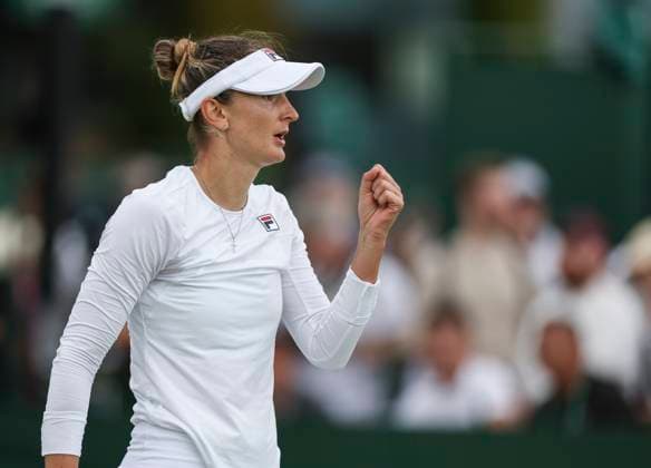 (240701) -- LONDON, July 1, 2024 -- Irina-Camelia Begu celebrates scoring during the women s singles first round match between Zhu Lin of China and Irina-Camelia Begu of Romania at Wimbledon tennis Championship in London, Britain, on July 1, 2024. ) (SP)BRITAIN-LONDON-TENNIS-WIMBLEDON-DAY 1 HanxYan 