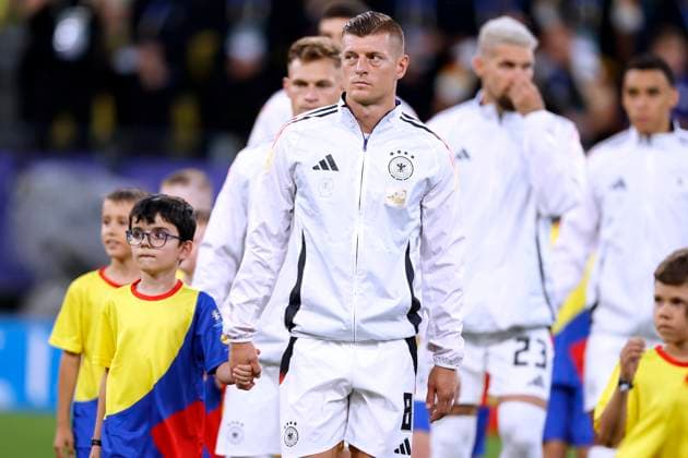 KROOS Toni Team Germany with ball kid marching in before the match UEFA Football EURO 2024 in Germany Round of 16 match Germany Denmark 2 0 on 29 06 2024 in Dortmund DFL REGULATIONS PROHIBIT ANY USE OF PHOTOGRAPHS as IMAGE SEQUENCES and or QUASI VIDEO Copyright: xLacixPerenyix