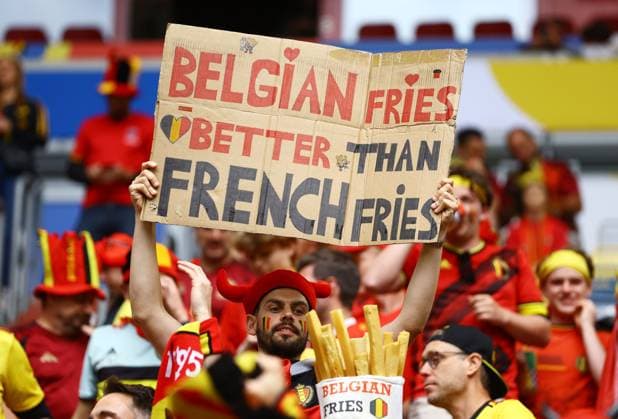 A Belgium fan holds a sign that reads Belgium fries better than French fries in the stadium before the game France v Belgium, UEFA European Championship, EM, Europameisterschaft 2024, Round of 16, Football, Dusseldorf Arena, Dusseldorf, Germany - 01 Jul 2024 EDITORIAL USE ONLY No use with unauthorised audio, video, data, fixture lists, club league logos or live services. Online in-match use limited to 120 images, no video emulation. No use in betting, games or single club league player publications. Copyright: xKieranxMcManus Shutterstockx 14566634o
