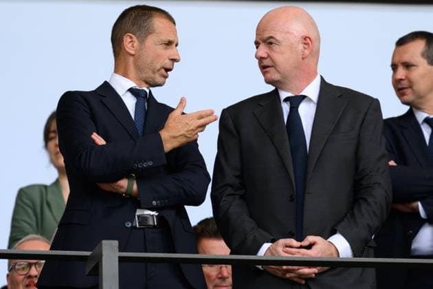 290624 KAI SCHWOERER UEFA President Aleksander Ceferin and FIFA President Gianni Infantino (L-R) chat prior to the UEFA EURO, EM, Europameisterschaft,Fussball 2024 round of 16 match between Switzerland and Italy at Olympiastadion on June 29, 2024 in Berlin, Germany. 290624-CPL-SUIvITA-104