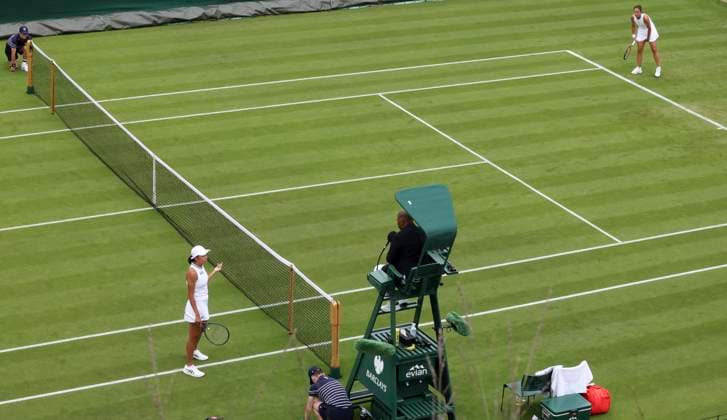 (240701) -- LONDON, July 1, 2024 -- Zhang Shuai (bottom L) questions a call during the women s singles first round match between Zhang Shuai of China and Daria Kasatkina of Russia at Wimbledon tennis Championship in London, Britain, on July 1, 2024. ) (SP)BRITAIN-LONDON-TENNIS-WIMBLEDON-DAY 1 HanxYan 
