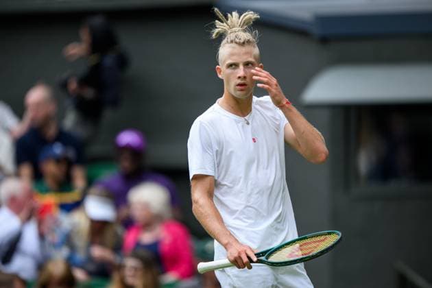 240701 Mark Lajal of Estonia competes in a first round singles tennis match during day 1 of Wimbledon on July 1, 2024 in London Photo Jesper Zerman BILDBYRAN kod JZ JZ0547 tennis wimbledon day 1 bbeng jubel  Copyright: JESPERxZERMAN BB240701JZ045