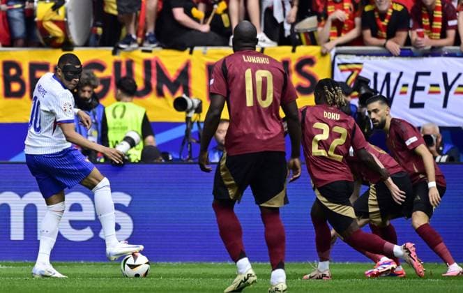 France s Kylian Mbappe and Belgium s Jeremy Doku pictured in action during a soccer game between France and Belgian national soccer team Red Devils, Monday 01 July 2024 in Dusseldorf, Germany, the Round of 16 game in the UEFA EURO, EM, Europameisterschaft,Fussball 2024 European championships. DIRKxWAEM  x95641498x