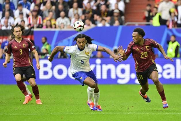 Belgium s Arthur Theate, France s Jules Kounde and Belgium s Lois Openda pictured in action during a soccer game between France and Belgian national soccer team Red Devils, Monday 01 July 2024 in Dusseldorf, Germany, the Round of 16 game in the UEFA EURO, EM, Europameisterschaft,Fussball 2024 European championships. DIRKxWAEM  x95641543x