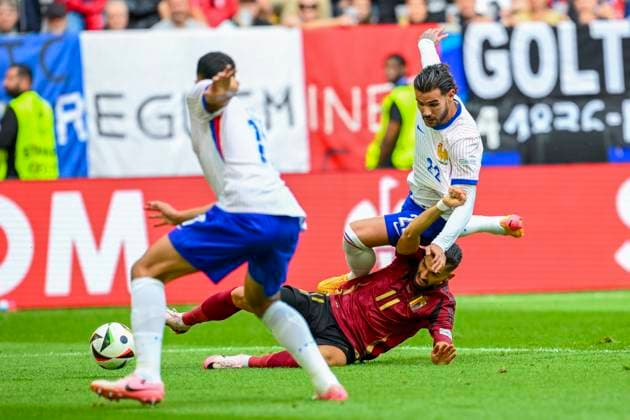France v Belgium Round of 16 - UEFA EURO, EM, Europameisterschaft,Fussball 2024 DUSSELDORF, GERMANY - JULY 01 : Carrasco Yannick forward of Belgium, Theo Hernandez defender of France in action during the UEFA EURO 2024 European Football Championship tournament round of 16 match between France and Belgium at Dusseldorf Arena on July 1, 2024 in Dusseldorf, Germany, 01 07 2024 Dusseldorf Germany  Copyright: xVincentxKalutx