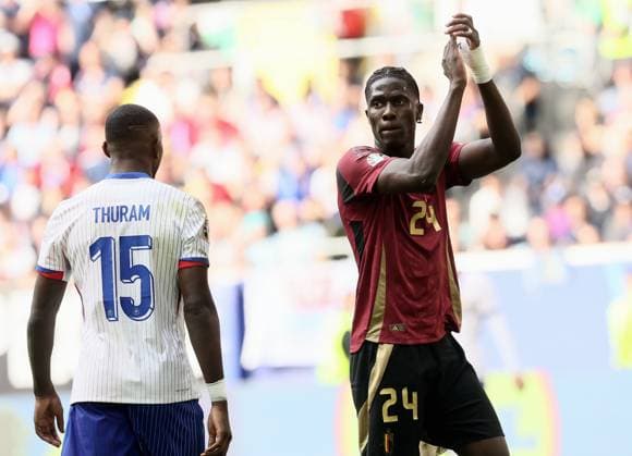 France s Marcus Thuram and Belgium s Amadou Onana pictured during a soccer game between France and Belgian national soccer team Red Devils, Monday 01 July 2024 in Dusseldorf, Germany, the Round of 16 game in the UEFA EURO, EM, Europameisterschaft,Fussball 2024 European championships. BRUNOxFAHY  x95641860x