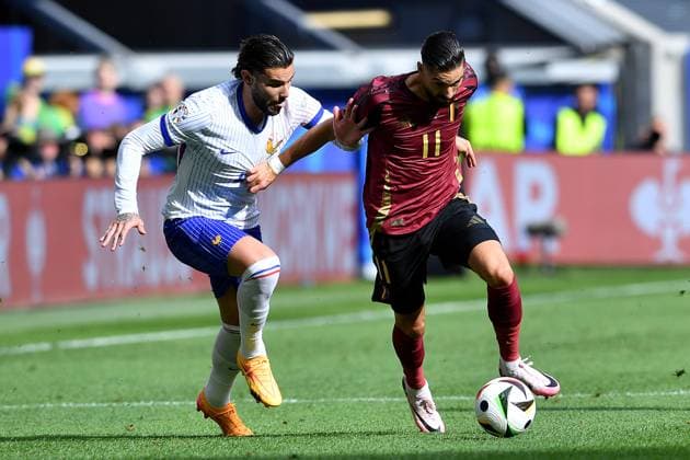 Soccer UEFA EURO 2024 Round of 16 France Belgium on 01 07 2024 at the Düsseldorf Arena in Düsseldorf Theo Hernandez France , left Yannick Carrasco Belgium , right xRx